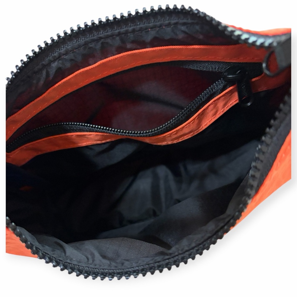 Orange Shoulder Bag with Minimal Silhouette and Adjustable Strap - Picture 3 of 10